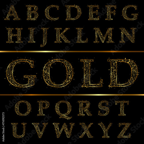 Gold glittering alphabet of stars dust trail
