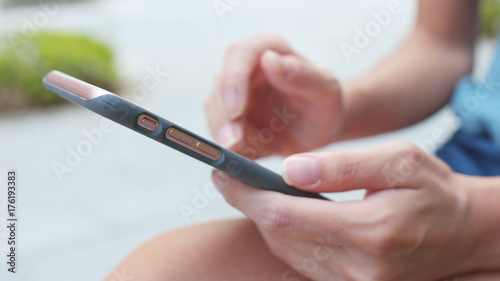 Close up of woman using mobile phone