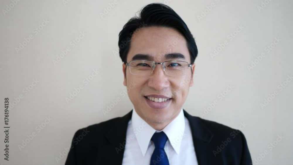 businessman facing camera. wearing glasses. businessman facing camera. wearing glasses.
