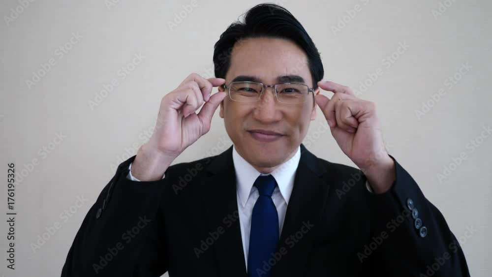 businessman facing camera. wearing glasses. businessman facing camera. wearing glasses.