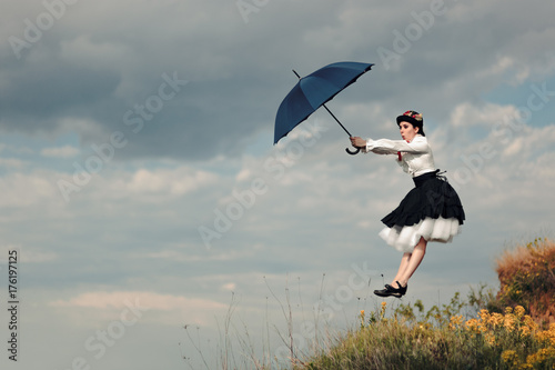Retro Woman with Umbrella Up in The Air in Fantasy Portrait