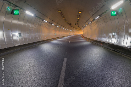 Bend in a road tunnel without traffic photo