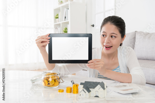 cheerful housewife planning buying new house