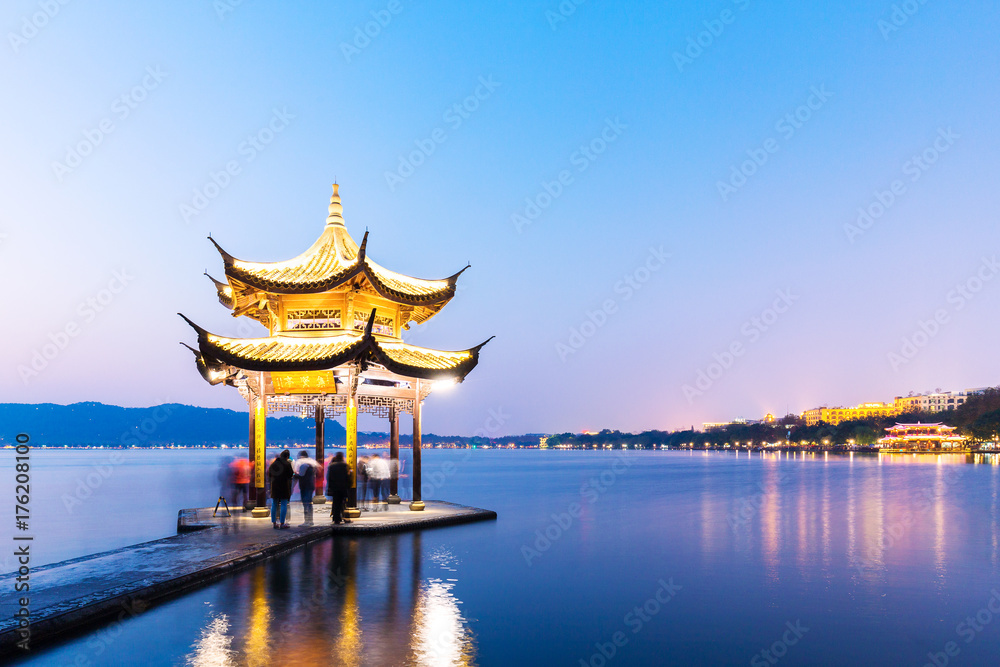 beautiful scene of lake with pavilion at twilight beautiful scene of lake with pavilion at twilight