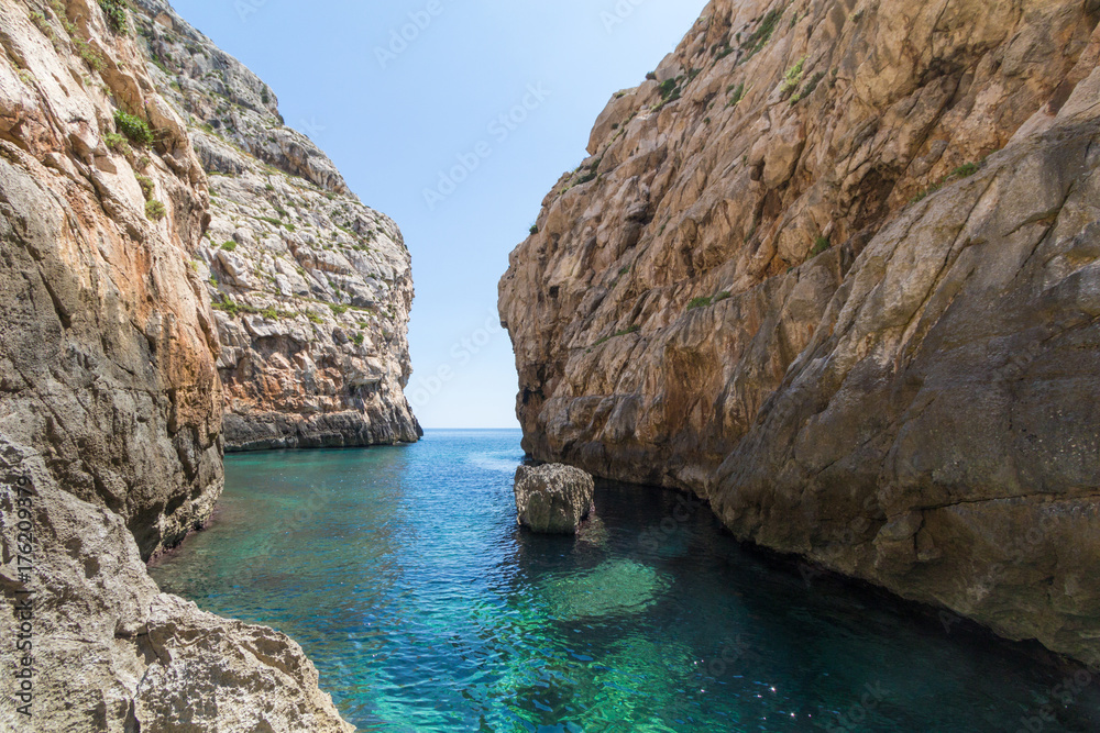 Wied Babu, at Wied iz-Zurrieq, azure blue turquoise waters at the bottom of the valley, next to the Blue Grotto, Zurrieq, Malta, May 2017