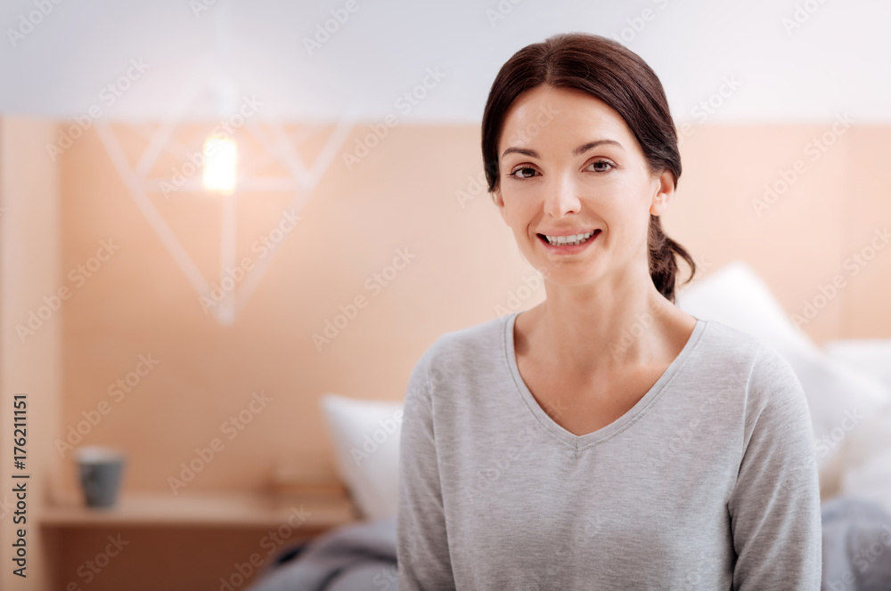 Cheerful young woman looking very happy Cheerful young woman looking very happy