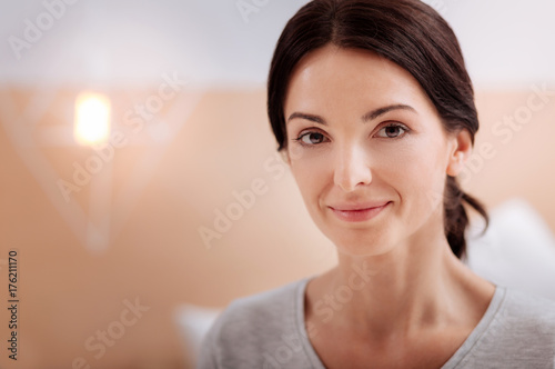 Beautiful face of a calm smiling woman