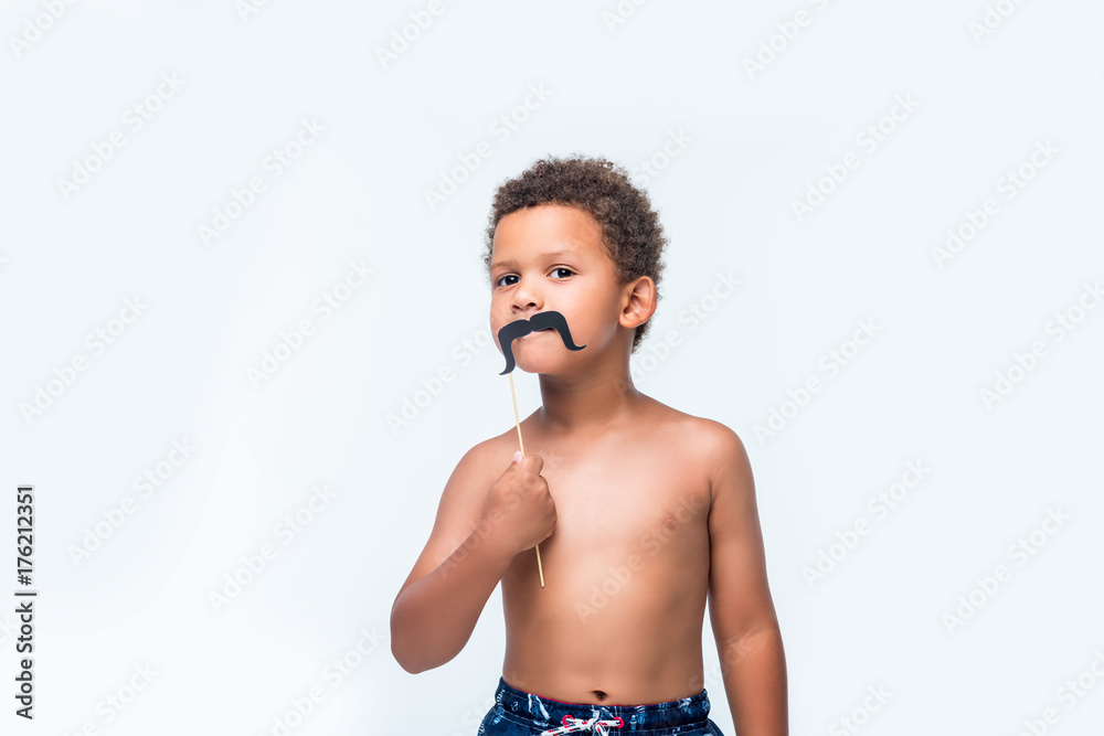 Fototapeta premium african american boy with false moustache
