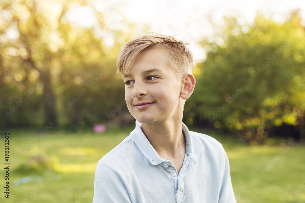 Portrait of blond boy (12-13) looking away Portrait of blond boy (12-13) looking away
