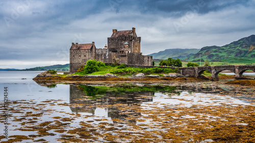 Cold dusk over loch at Eilean Donan Castle in Scotland