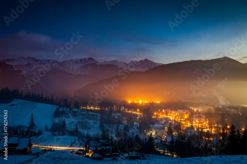 Skiing competitions in winter in Zakopane at dusk, Poland