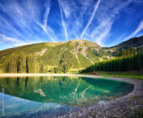 Idyllic summer landscape with mountain lake in the Alps