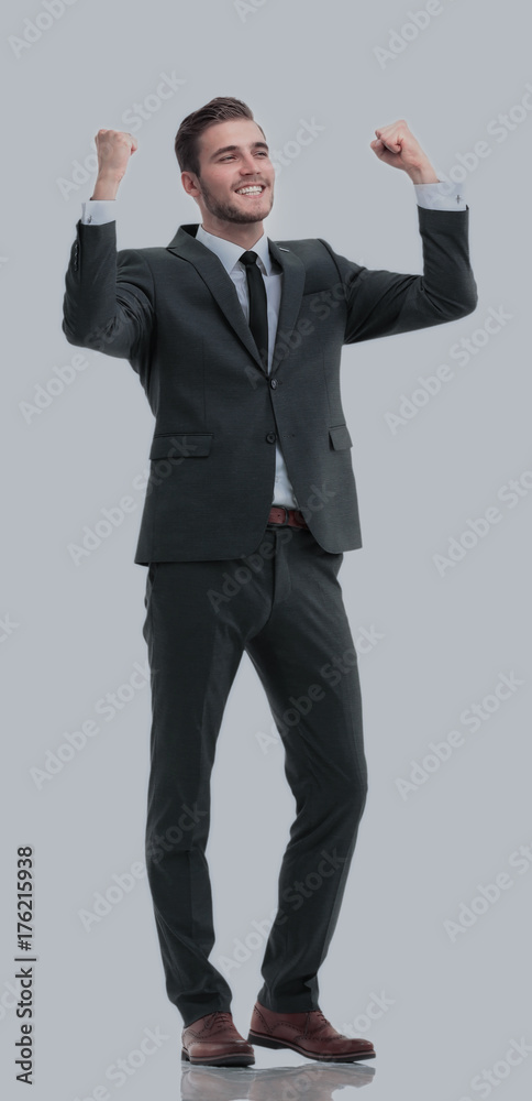 Excited smile business man raised arms, isolated over white Excited smile business man raised arms, isolated over white