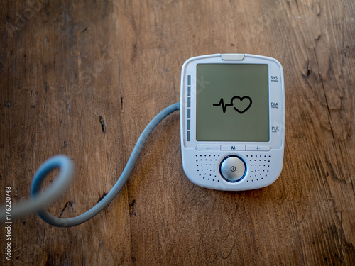 Digital device for measure blood pressure and pulse. Modern healthcare at home.