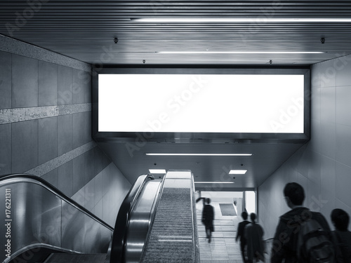 Fototapeta Naklejka Na Ścianę i Meble -  Mock up Banner in subway with escalator people walking Public building
