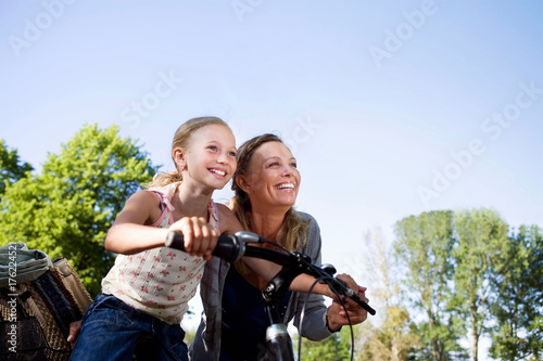Photography Mother and daughter with bike
