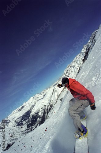 Photos Male in action on a snowboard