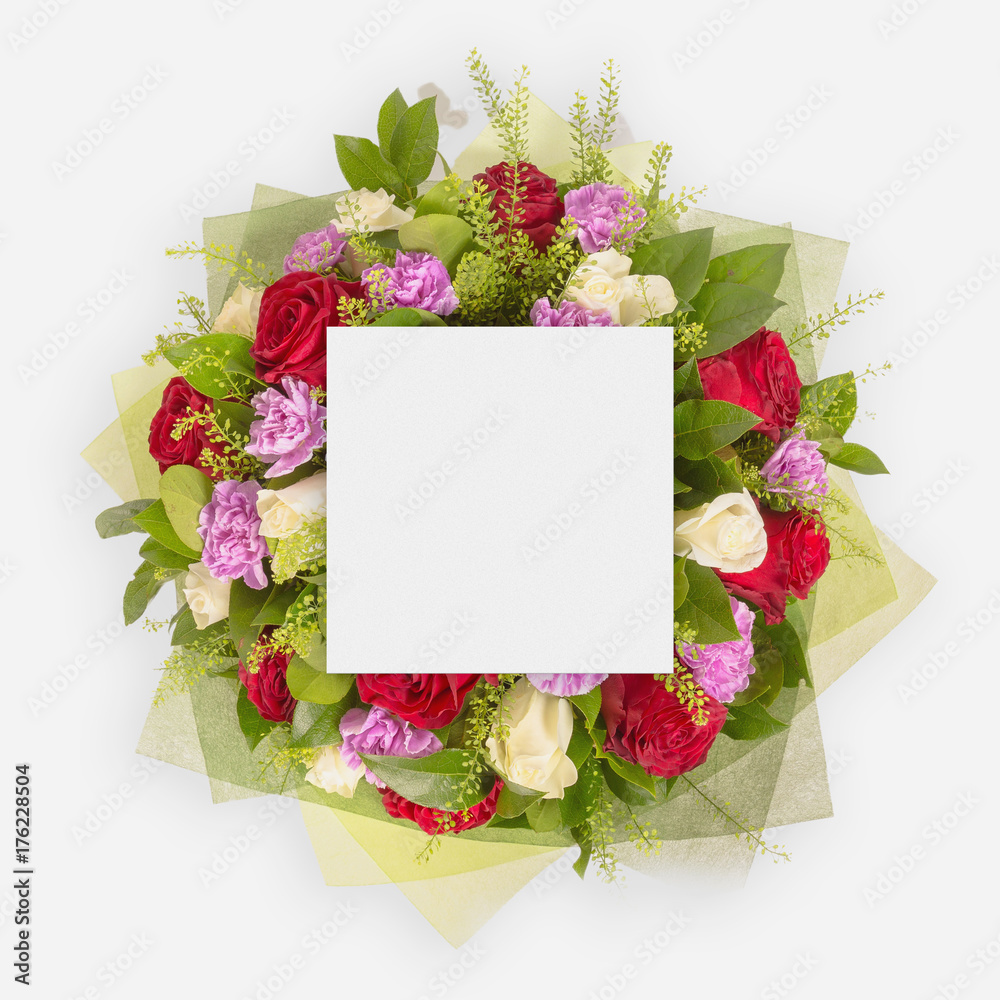 Fototapeta Creative layout made of flowers and leaves with paper card note. Flat lay