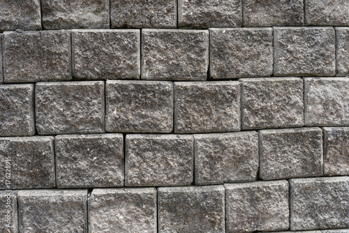 Old grungy gray brick wall texture
