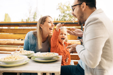 Family enjoying pasta