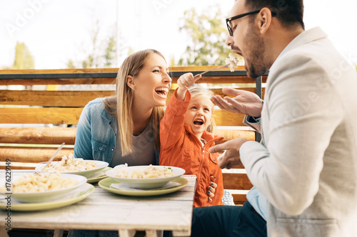 Family enjoying pasta