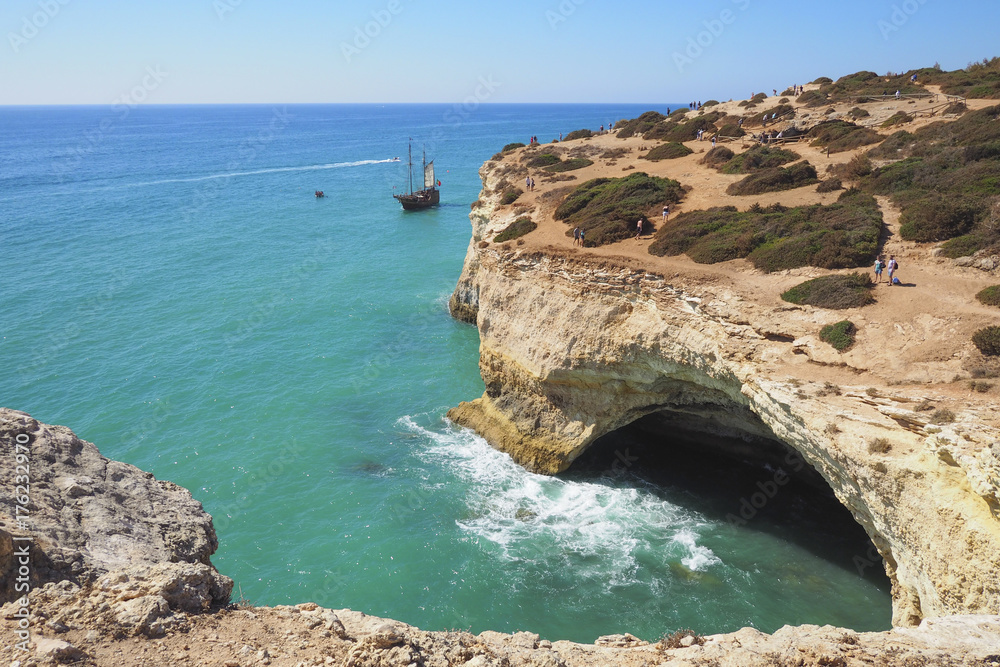 Obraz premium A view of a Praia da Rocha in Portimao, Algarve region, Portugal