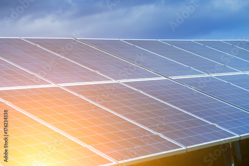 Solar panels  photovoltaic  alternative source environmentally friendly energy. In the backlight sunbeam light.