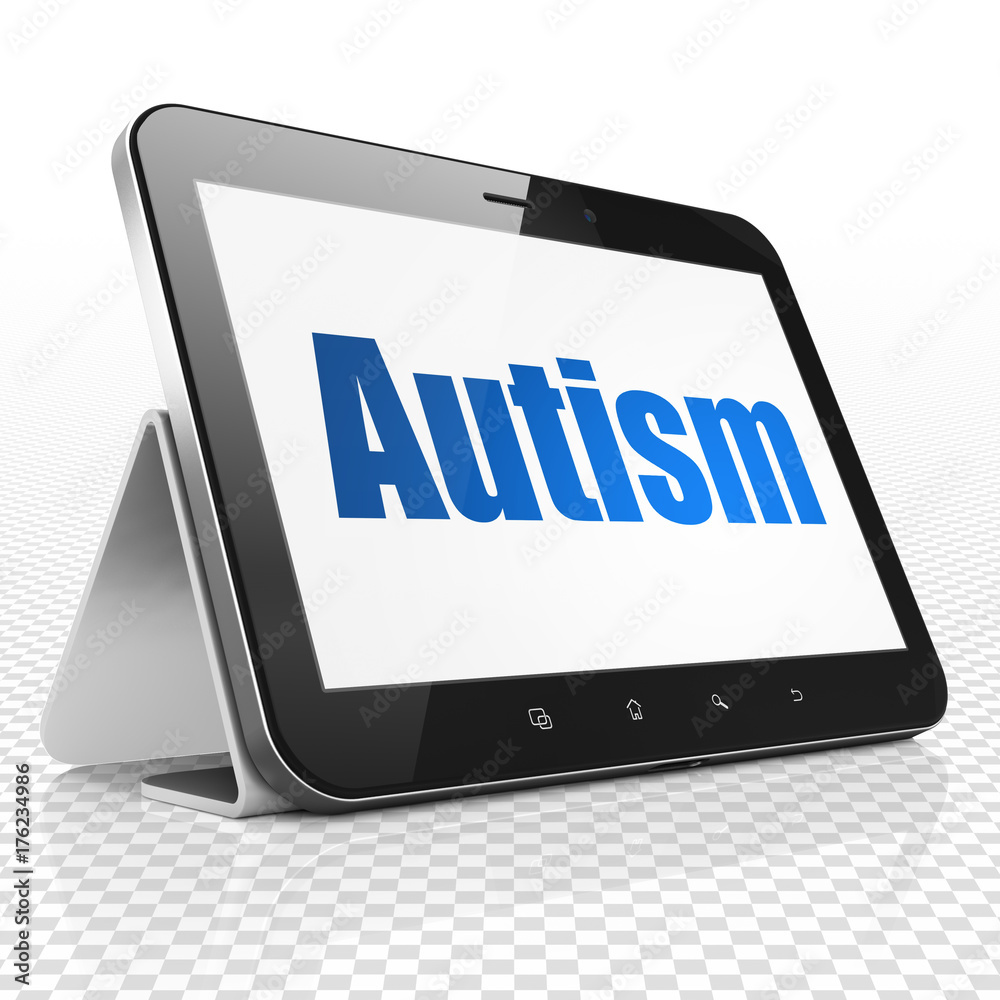 Medicine concept: Tablet Computer with Autism on display Medicine concept: Tablet Computer with Autism on display