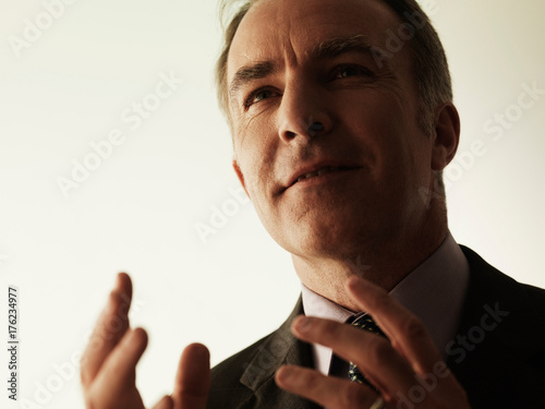 businessman gesturing with hands