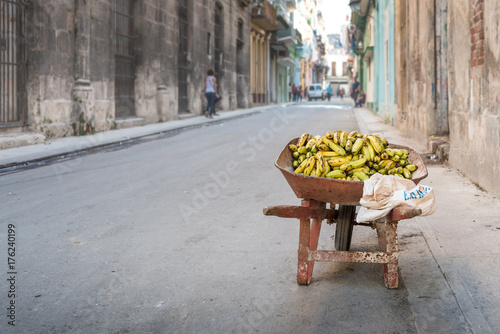 Bananas in a red rusty wheelbarrow - Havana, Cuba © mwennerwald.cphpx
