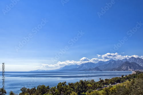 Panoramic view on Antalya beach, mountains and Mediterranean Sea from the Beach park. Antalya, Turkey