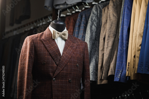 men's suit, shirt, tie on a mannequin in the store