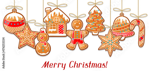 Merry Christmas greeting card with hanging gingerbread