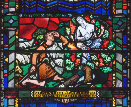 LONDON  GREAT BRITAIN - SEPTEMBER 16  2017  The stained glass of Moses and the Burning Bush in church St Etheldreda by Charles Blakeman  1953 - 1953 .