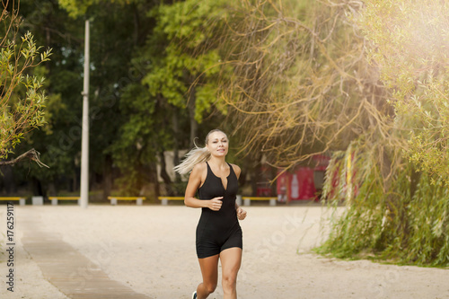  a sporty woman is warming up