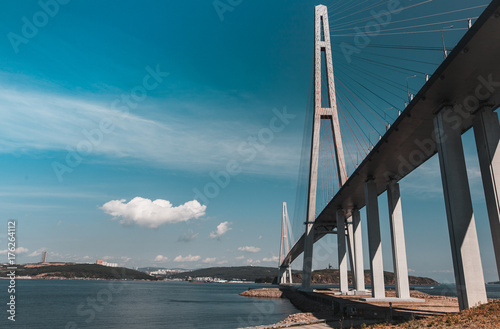 The long, handsome cable-stayed bridge on the island is Russian. Beautiful background