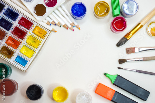  Hobby. Paints, brushes, pencils. White background