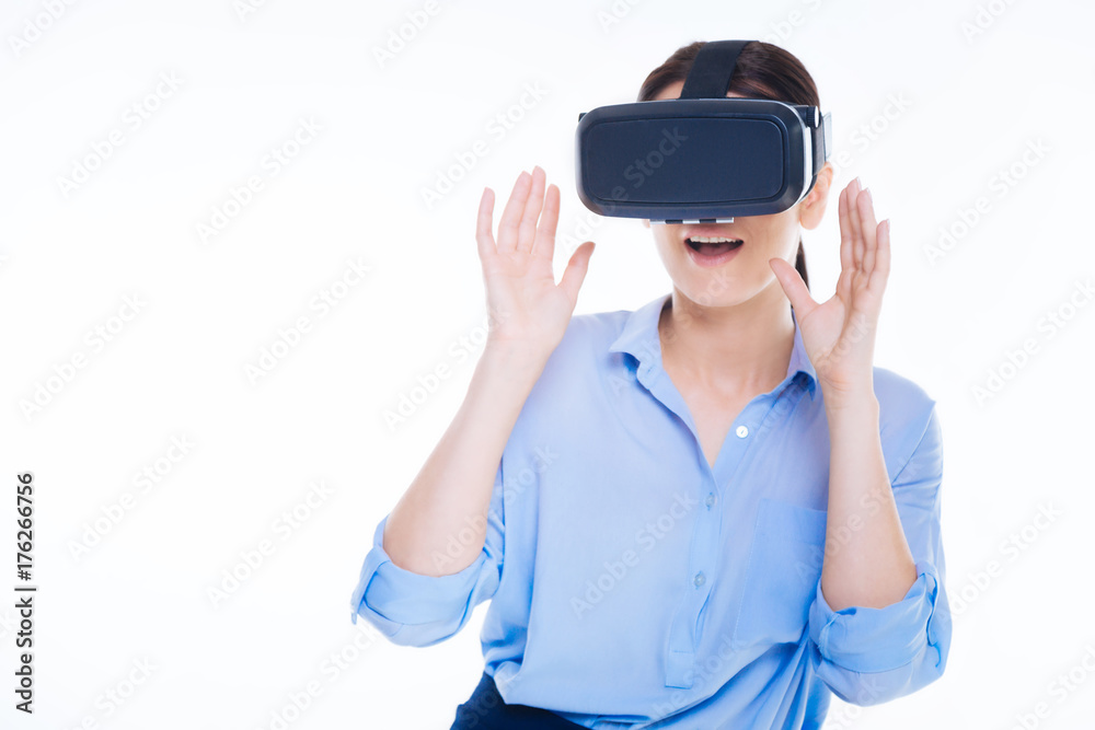 Pleasant young woman wearing 3d reality glasses Pleasant young woman wearing 3d reality glasses