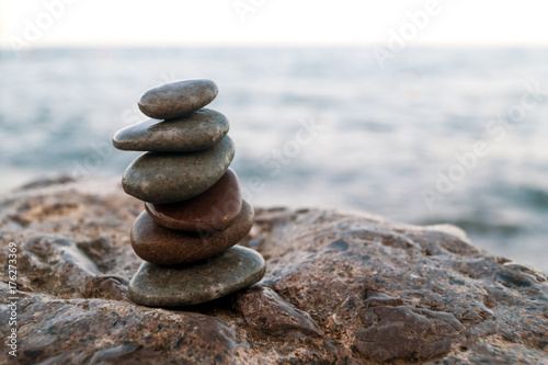 Pebble tower standing on the left on the big stone