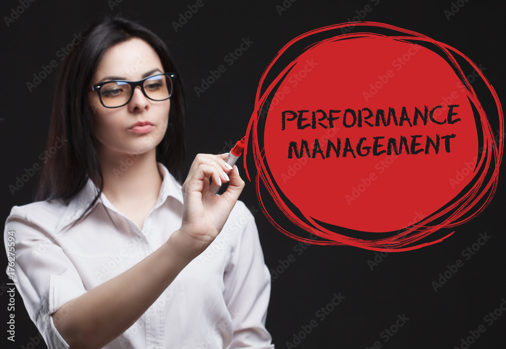 The concept of marketing, technology, the Internet and the network. A young businessman shows what is important for business: Performance management The concept of marketing, technology, the Internet and the network. A young businessman shows what is important for business: Performance management