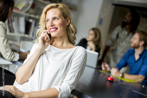 Businesswoman using mobile ...