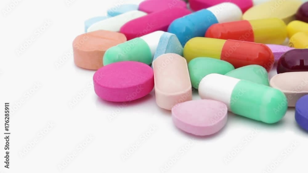 pills rotating on isolated white pills rotating on isolated white