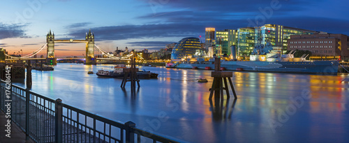 London - The panorama with the Tower bridge and the riverside at morning dusk.