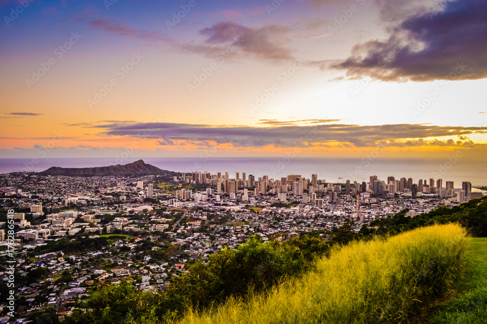 Aerial Purple and Gold Sunset Above Honolulu Skyline in Hawaii