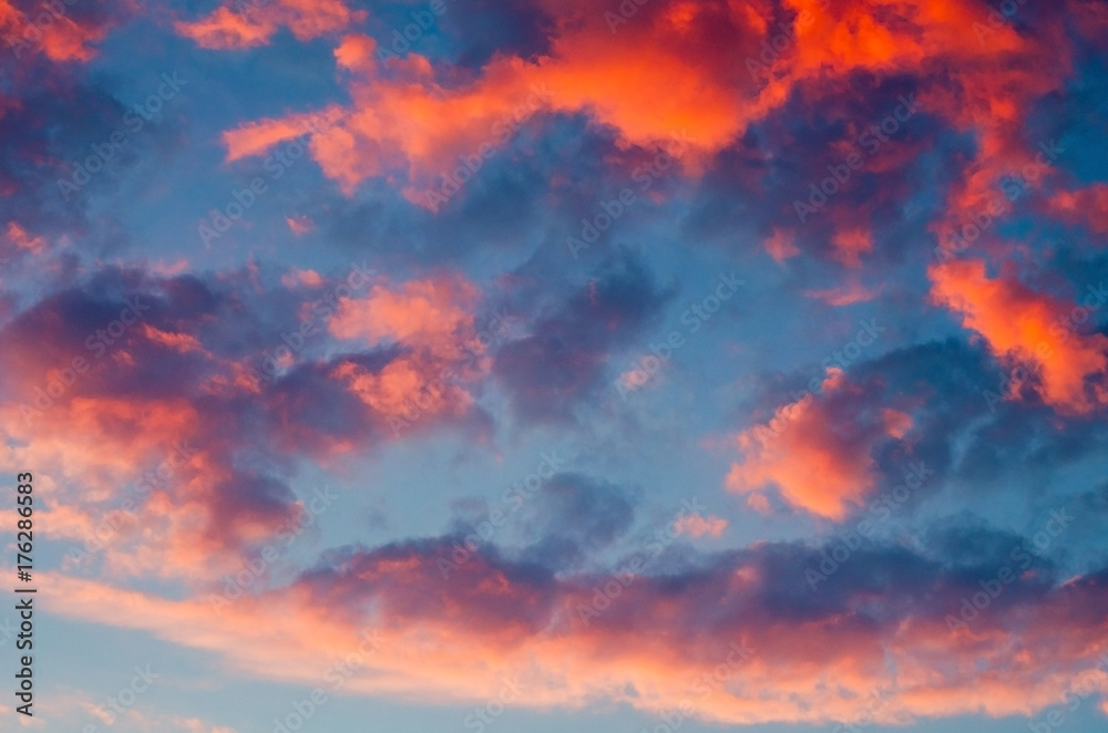 Beautiful sunset or sunrise with clouds, in pink and purple hues