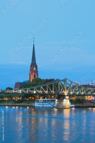River, bridge and church. Frankfurt am Main, Germany