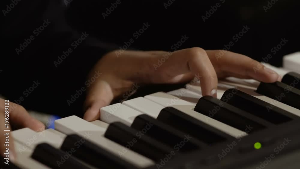 Male hands plays melody on piano Male hands plays melody on piano