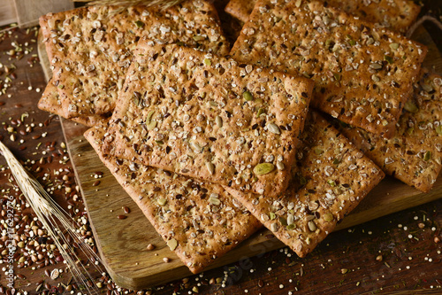 brown crackers topped with seeds