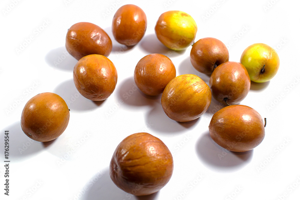 Jujube fruits close up on white background. Jujube fruits close up on white background.