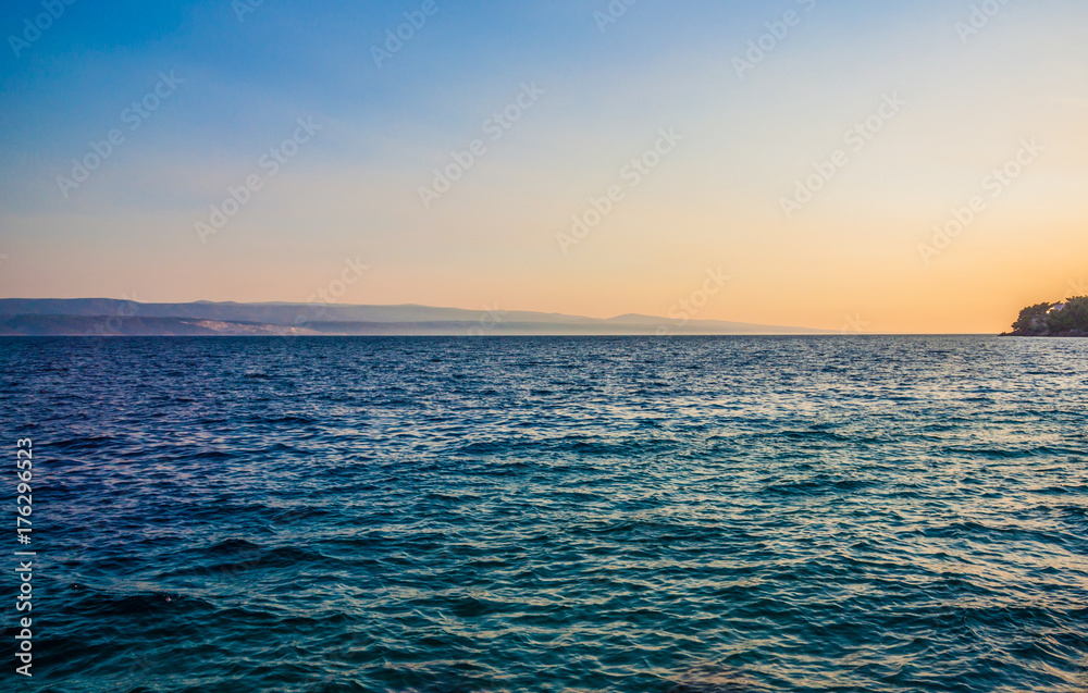 Obraz premium Rocky coastline with magical sunrise, Mimice, Croatia,Europe